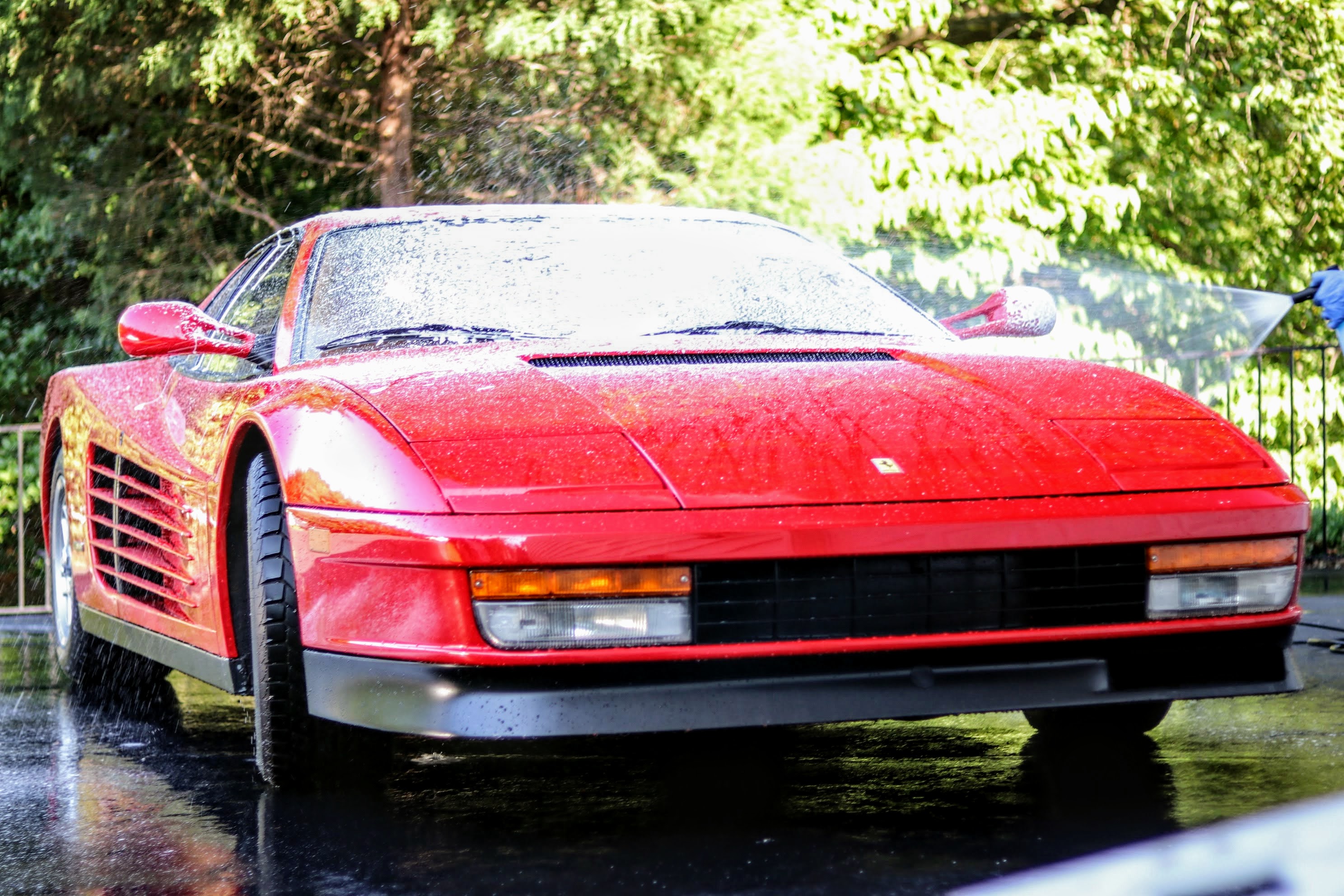 Ferrari Testarossa being sprayed with Adam's Polishes Car Shampoo foam from the MTM Hydro foam lance Ferrari Testarossa being sprayed with Adam's Polishes Car Shampoo foam from the MTM Hydro foam lance